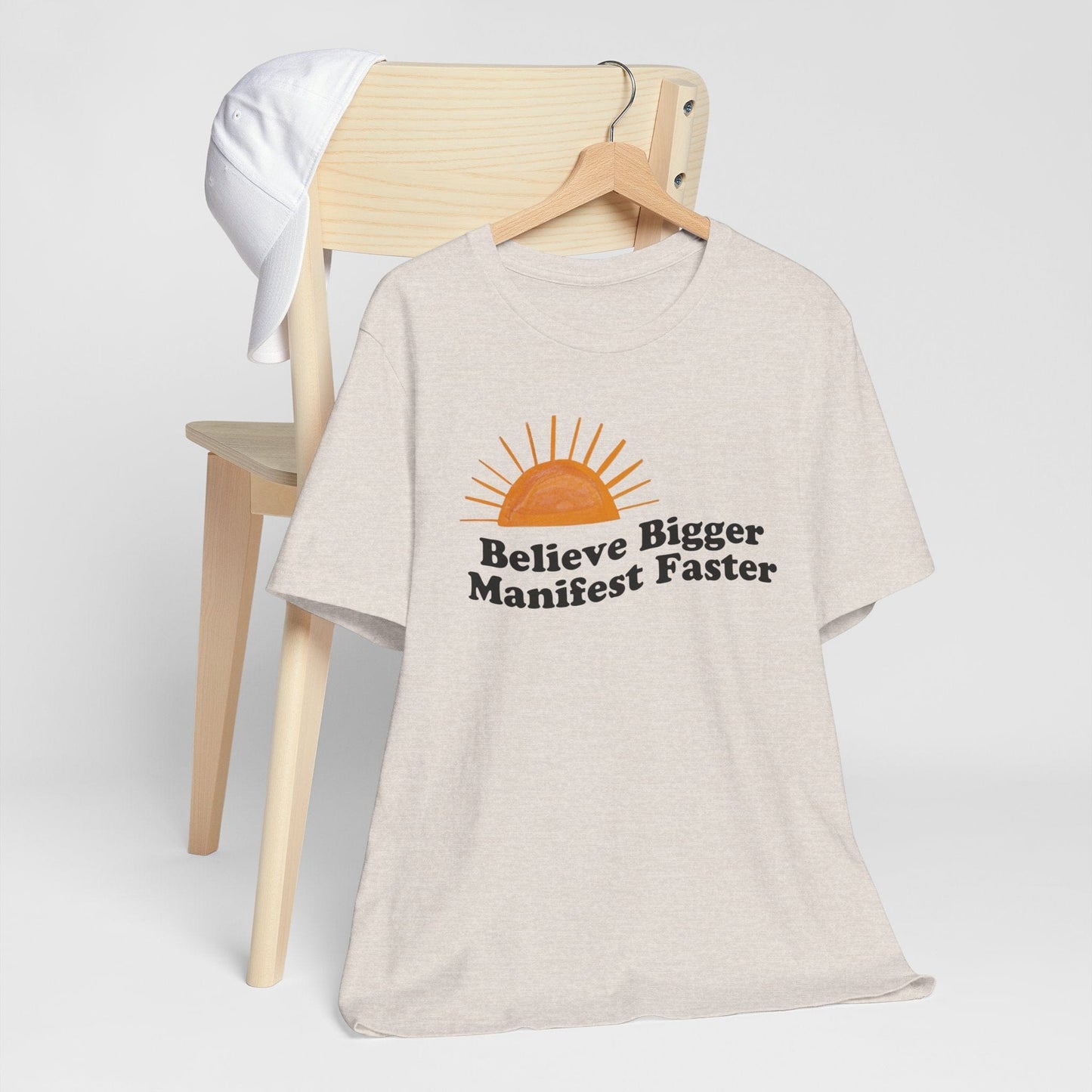 Motivational Unisex Jersey Tee - 'Believe Bigger, Manifest Faster'