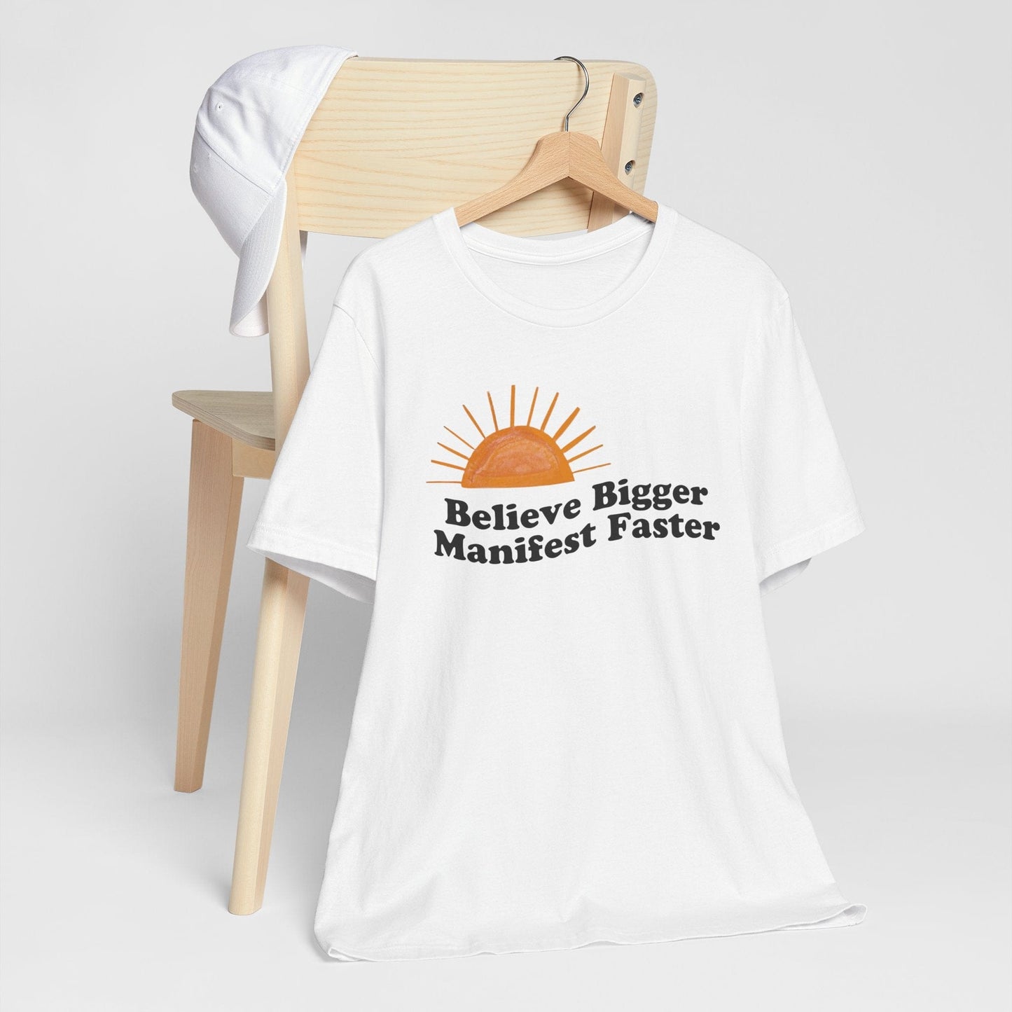 Motivational Unisex Jersey Tee - 'Believe Bigger, Manifest Faster'