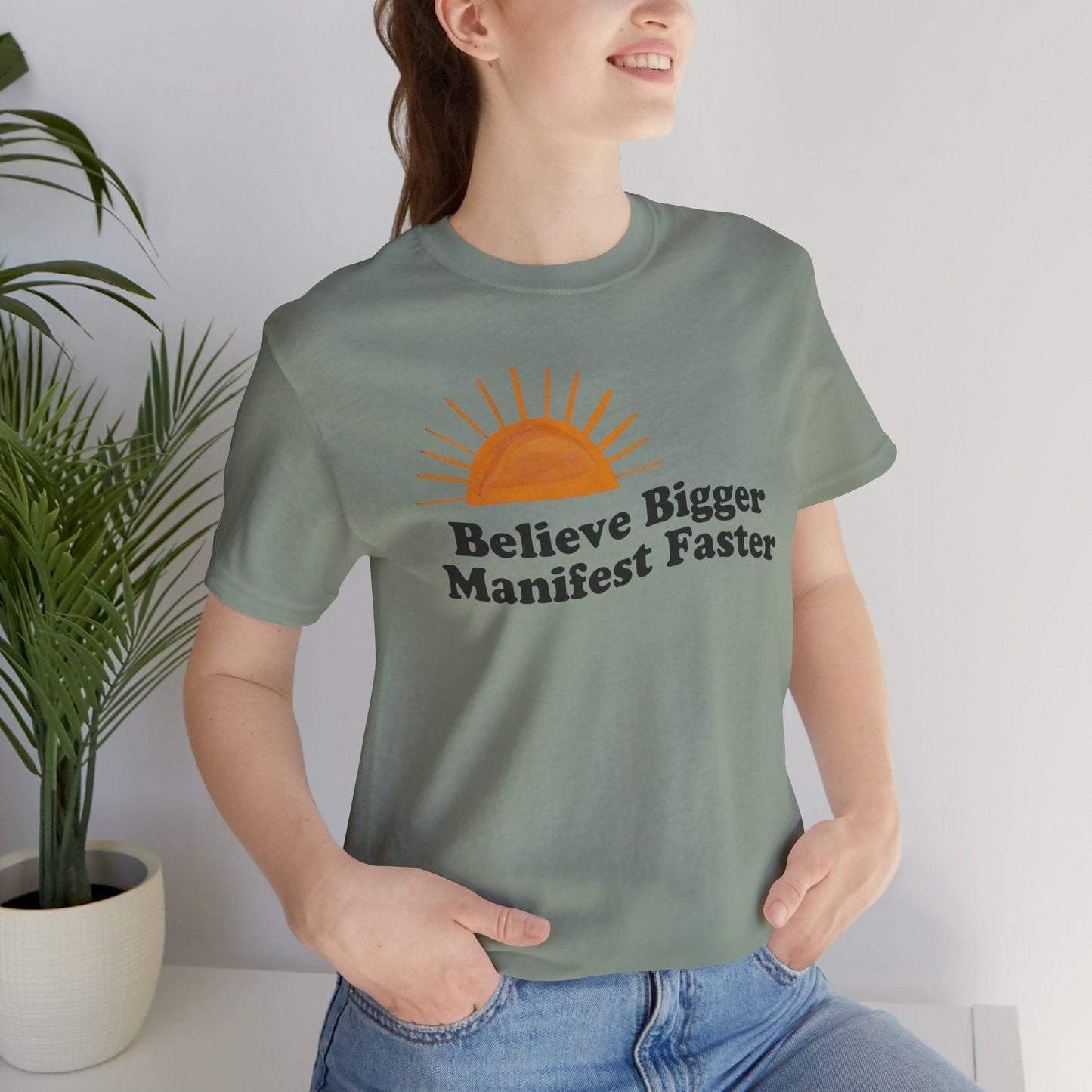 Believe Bigger Manifest Faster Unisex Short Sleeve Tee