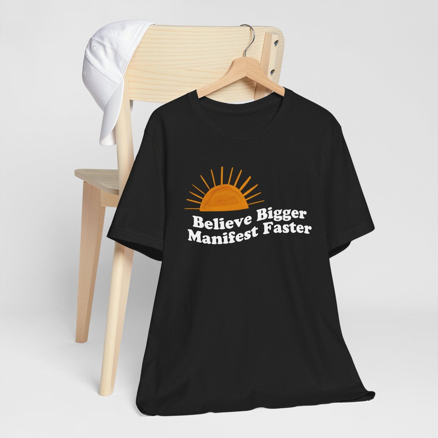 Motivational Unisex Jersey Tee - 'Believe Bigger, Manifest Faster'