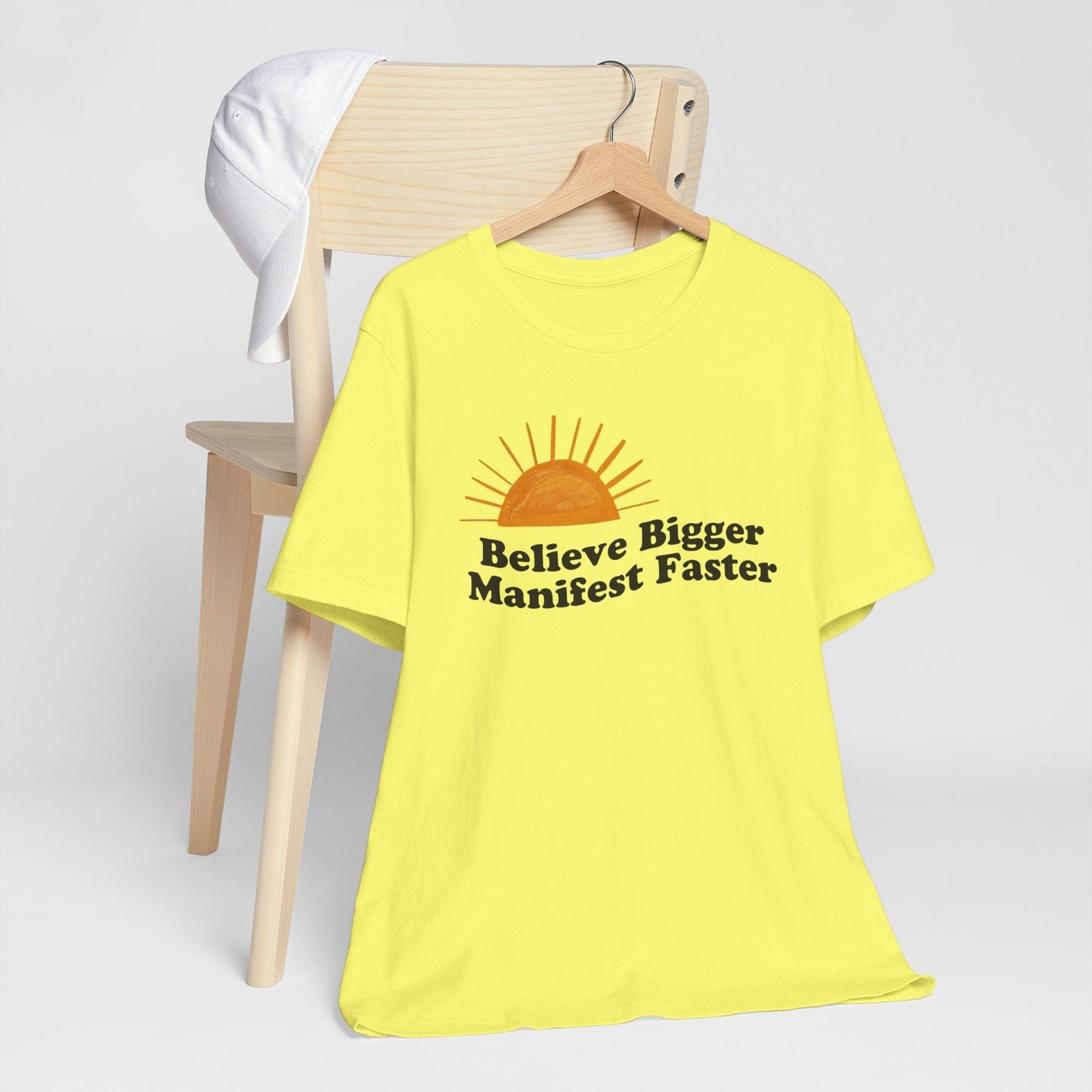 Motivational Unisex Jersey Tee - 'Believe Bigger, Manifest Faster'
